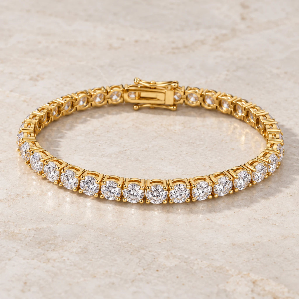 Eclavine 5mm moissanite tennis bracelet in gold, laid flat on marble
